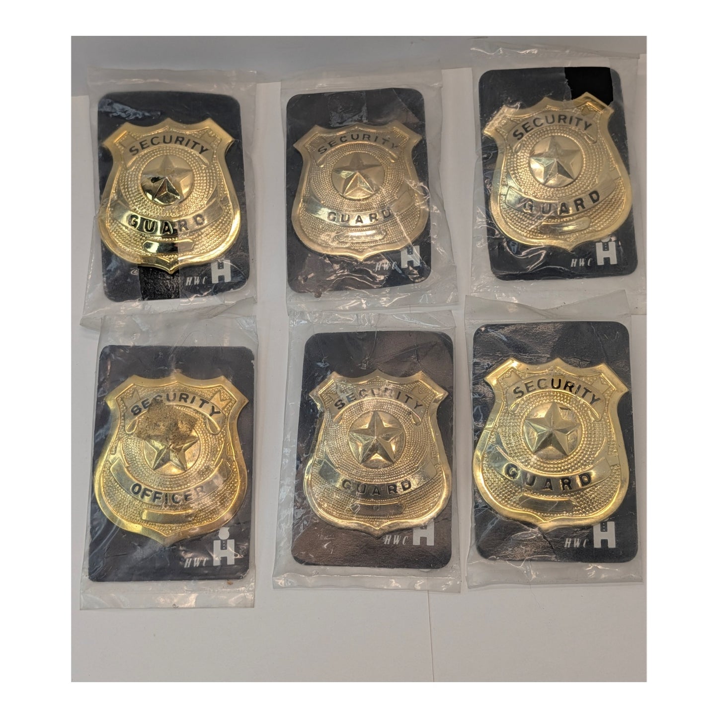 Lot of 6 Vintage HWC Security Guard Badges NOS Gold Tone Metal Prop