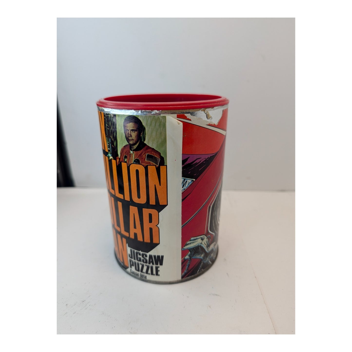 Vintage 1975 Six Million Dollar Man Jigsaw Puzzle in Can APC Collectible