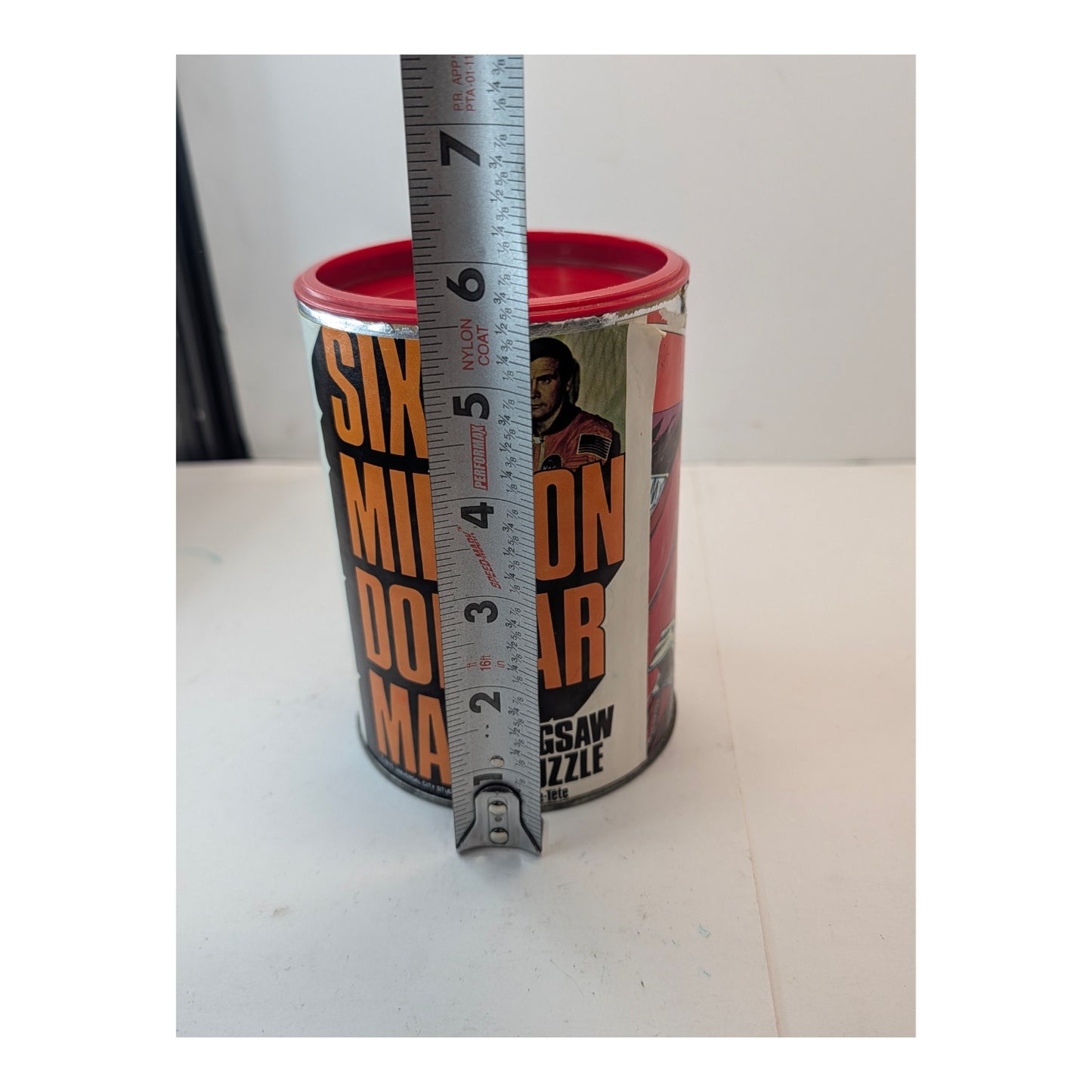 Vintage 1975 Six Million Dollar Man Jigsaw Puzzle in Can APC Collectible